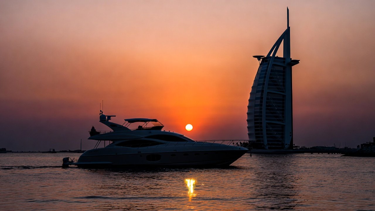 Sunset cruise on a luxury yacht in Dubai with Burj Al Arab and Palm Jumeirah views